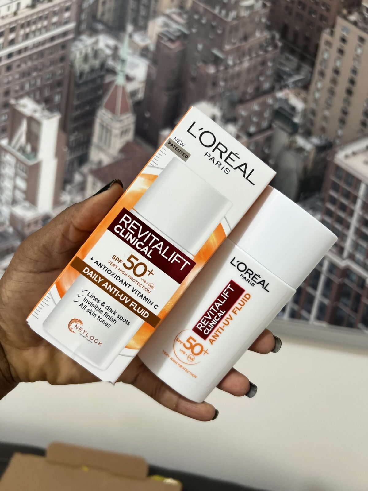 L’Oréal Paris Revitalift Clinical SPF 50+ AntiOxidant Vitamin C Daily Anti-UV Fluid Sunscreen Loreal - Image 1