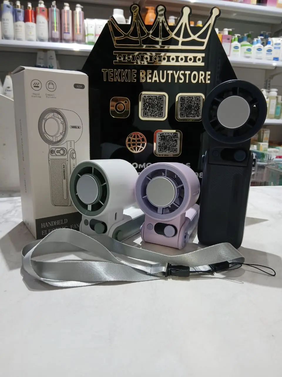 d2fdc896-22d7-4f31-ab00-55cd08910abc HANDHELD ELECTRIC FAN - Foldable Digital Portable Handheld Turbo Fan With Ice Cooler | AC fan | long battery life - Image 1